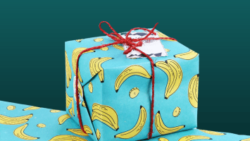 2020 sex-positive gift guide by @FeministSexEd (image shows packages wrapped in paper with illustrated bananas)